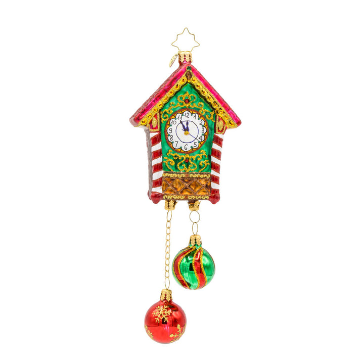 Jolly Timekeeper ornament. Santa holds a gift in the center of this festive take on a cuckoo clock. The face of a clock is seen on the back. View of back.