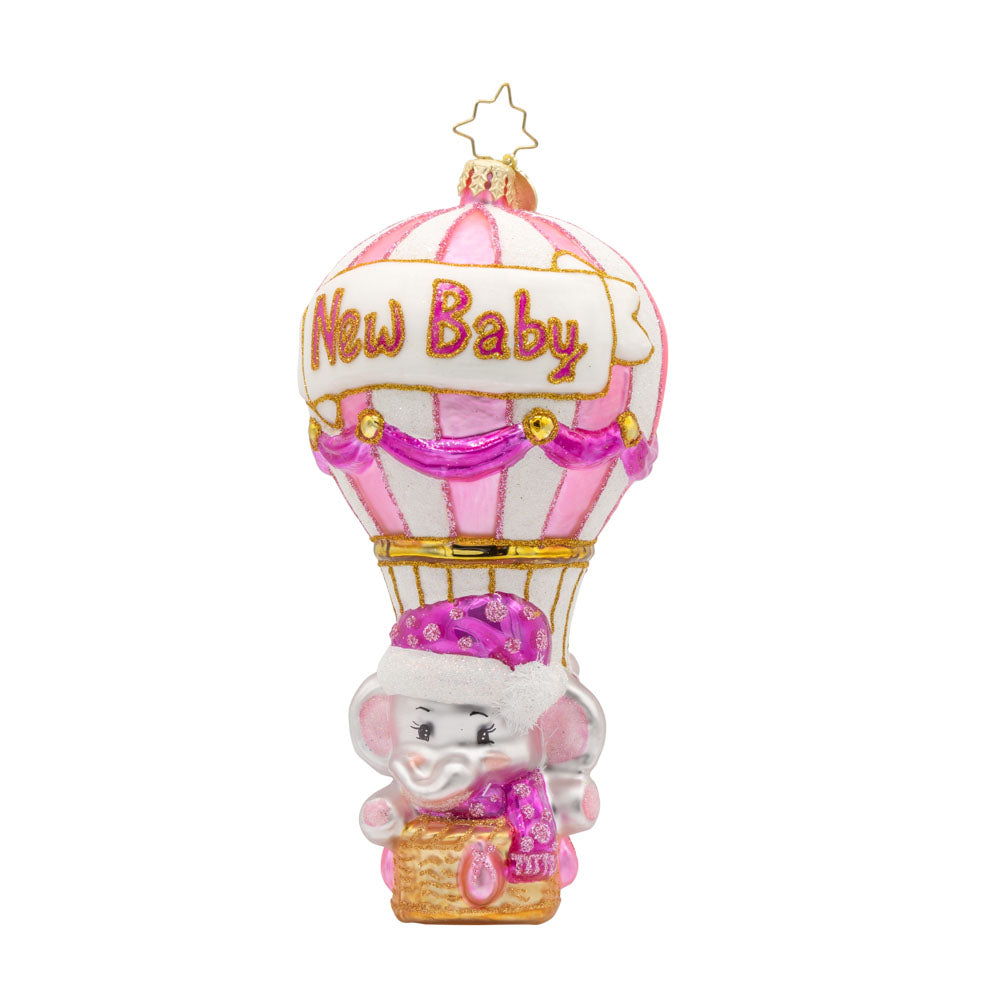 Baby Pink Balloon Adventure ornament. Features a baby pink elephant in a hot air balloon that has "New Baby" written on it. View of front. 