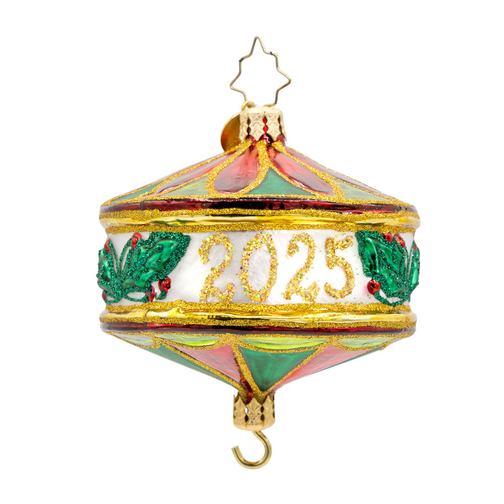 Remembering The Year 2025 ornament. Festive shades of green and red, sprigs of holly, and dated "2025." View of front. 