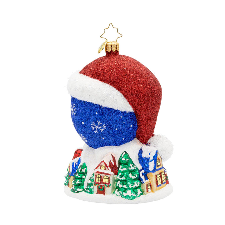 Twas the Night Before Moonlight ornament. Dressed in a Santa hat, this glowing moon dated with "2025" keeps a watchful eye on the Christmas village below. View of back.