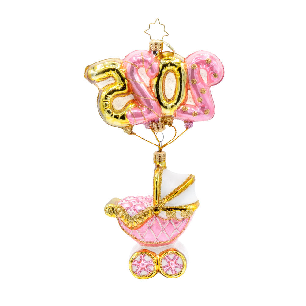 Baby Pink Cradle of Celebration ornament. Features a decorated baby pink carriage and "2025" shaped balloons. View of back.
