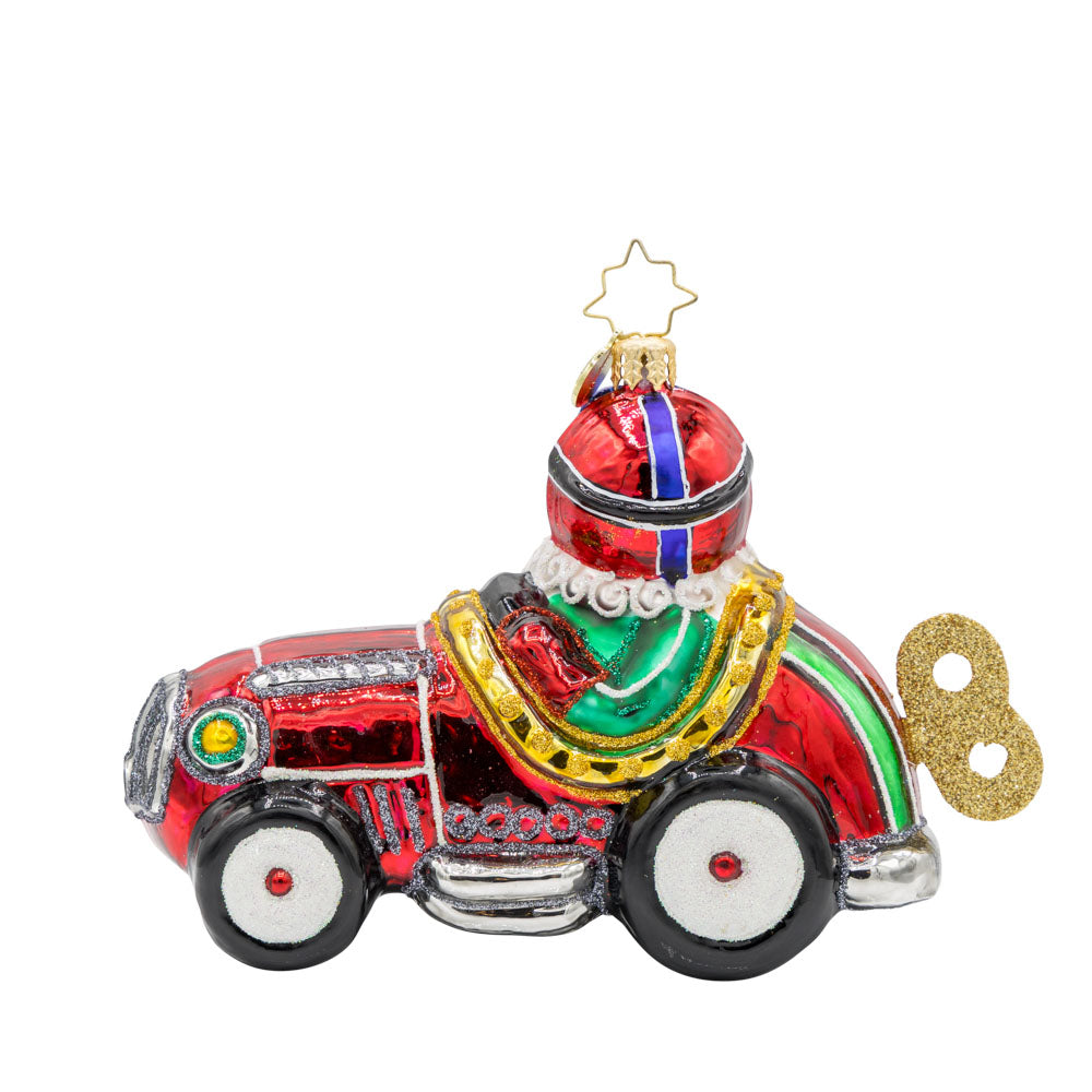 Kris Kringle Kart ornament. Santa speeds in a red racer car. View of back.