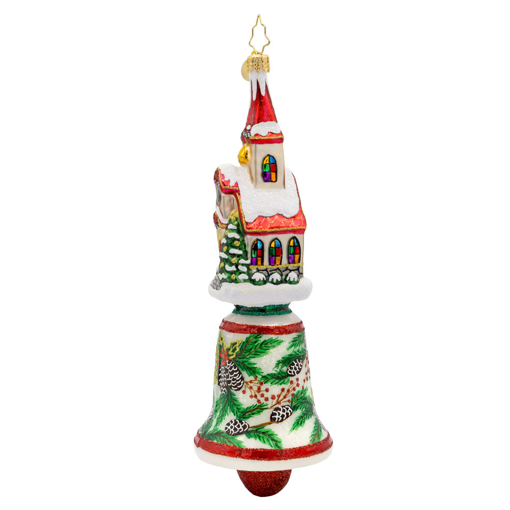 Chiming Church Charm ornament. This church features stained glass windows and a snow-covered roof atop a hand-painted bell. View of right side.