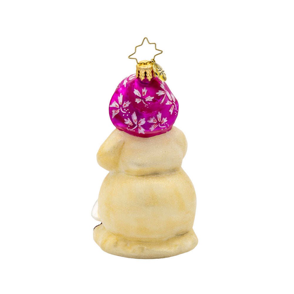 Coastal Chiller ornament. Sun-kissed snowman with a pink bucket, mittens, and flowered sun hat. Starfish buttons and a seagull friend in tow. View of back.