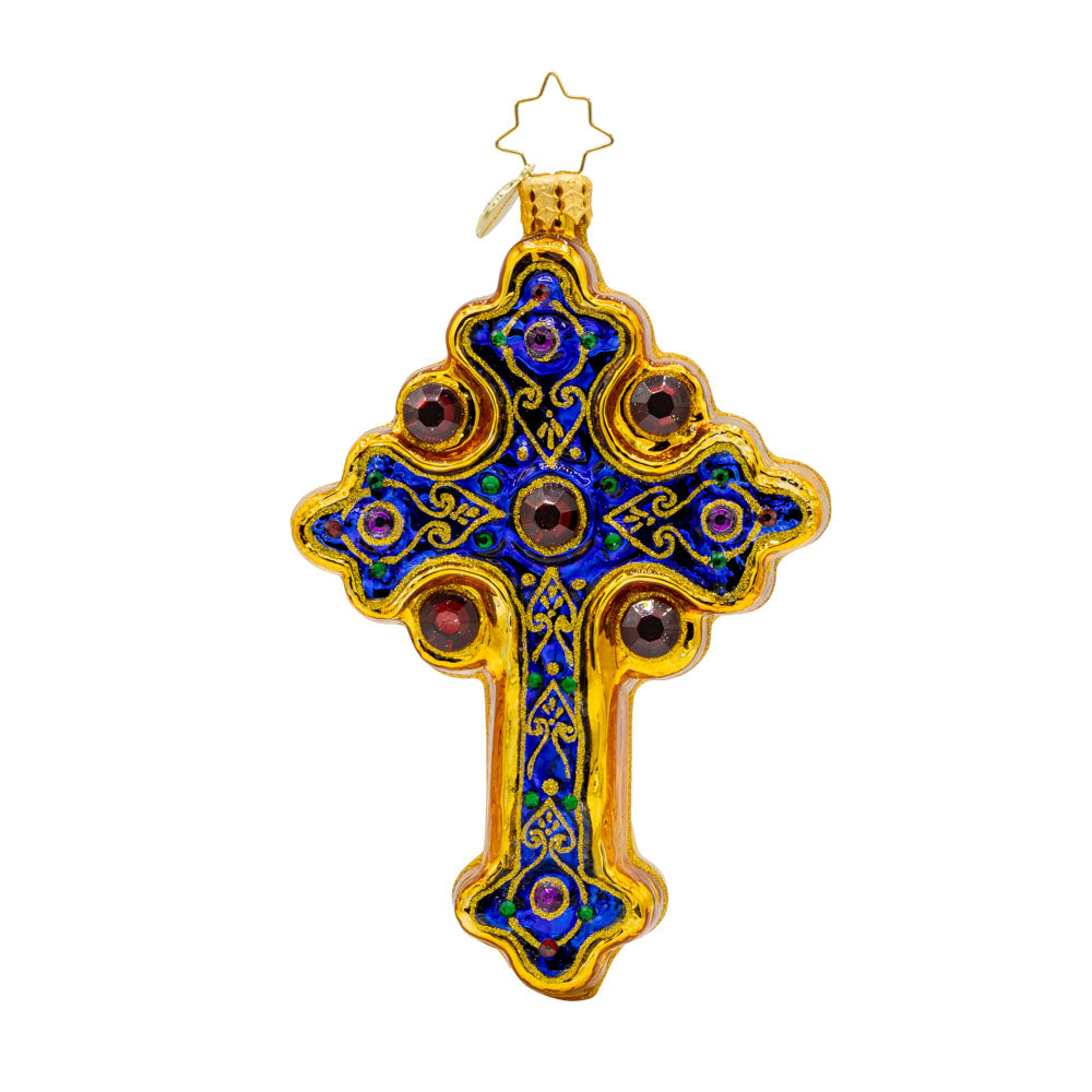Blessed Beacon ornament. Royal blue cross adorned with gold designs and jewels. View of front. 