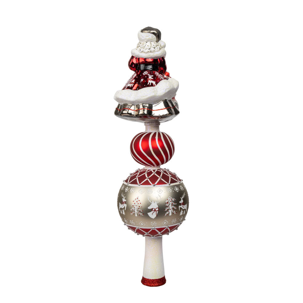 This enchanting finial features Santa, with his rosy cheeks, snowy beard, and a sack full of gifts above two decorated rounds. View of back.
