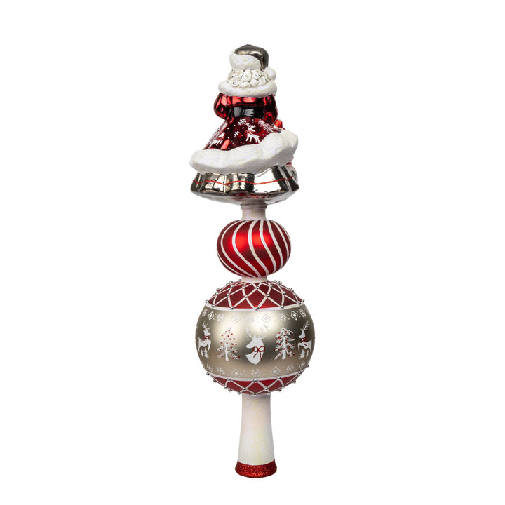 This enchanting finial features Santa, with his rosy cheeks, snowy beard, and a sack full of gifts above two decorated rounds. View of back.