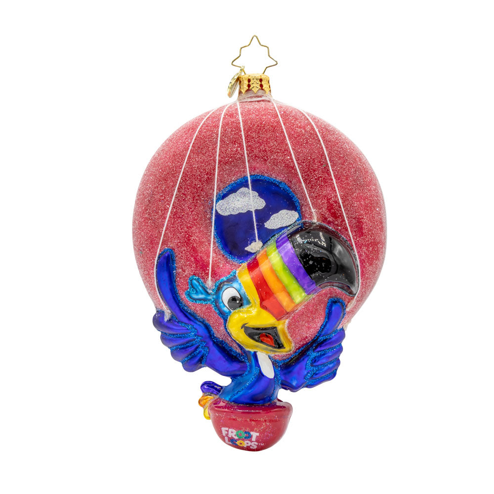 Toucan Sam's Balloon Ride Ornament. Join him as he soars through the clouds in his dazzling hot air balloon shaped like a giant Froot Loop. View of front.