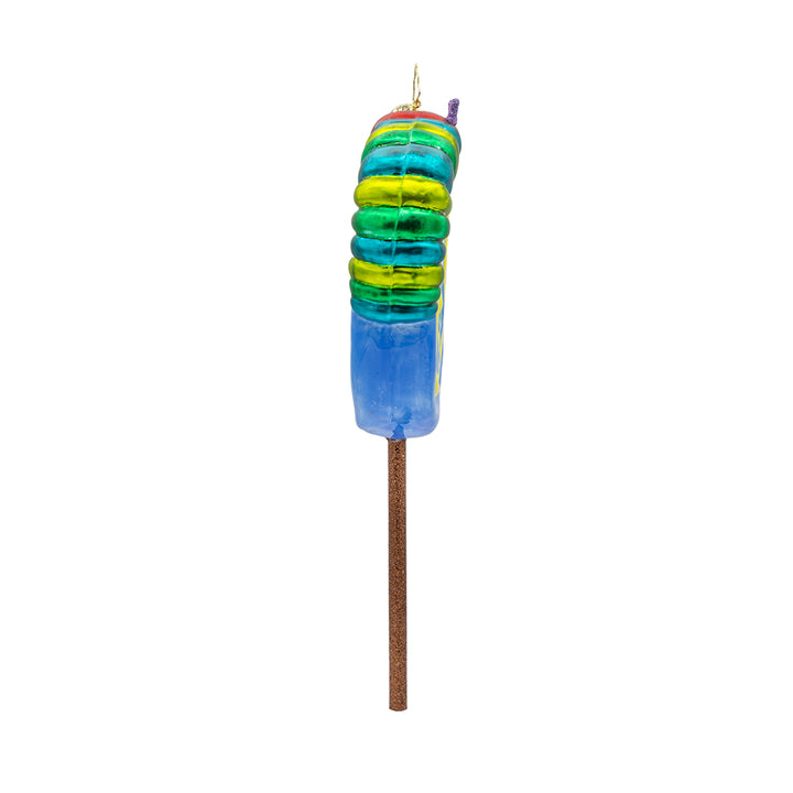 Lollipop Caterpillar ornament. Features a colorful caterpillar perched atop a shimmering lollipop. View of left side.