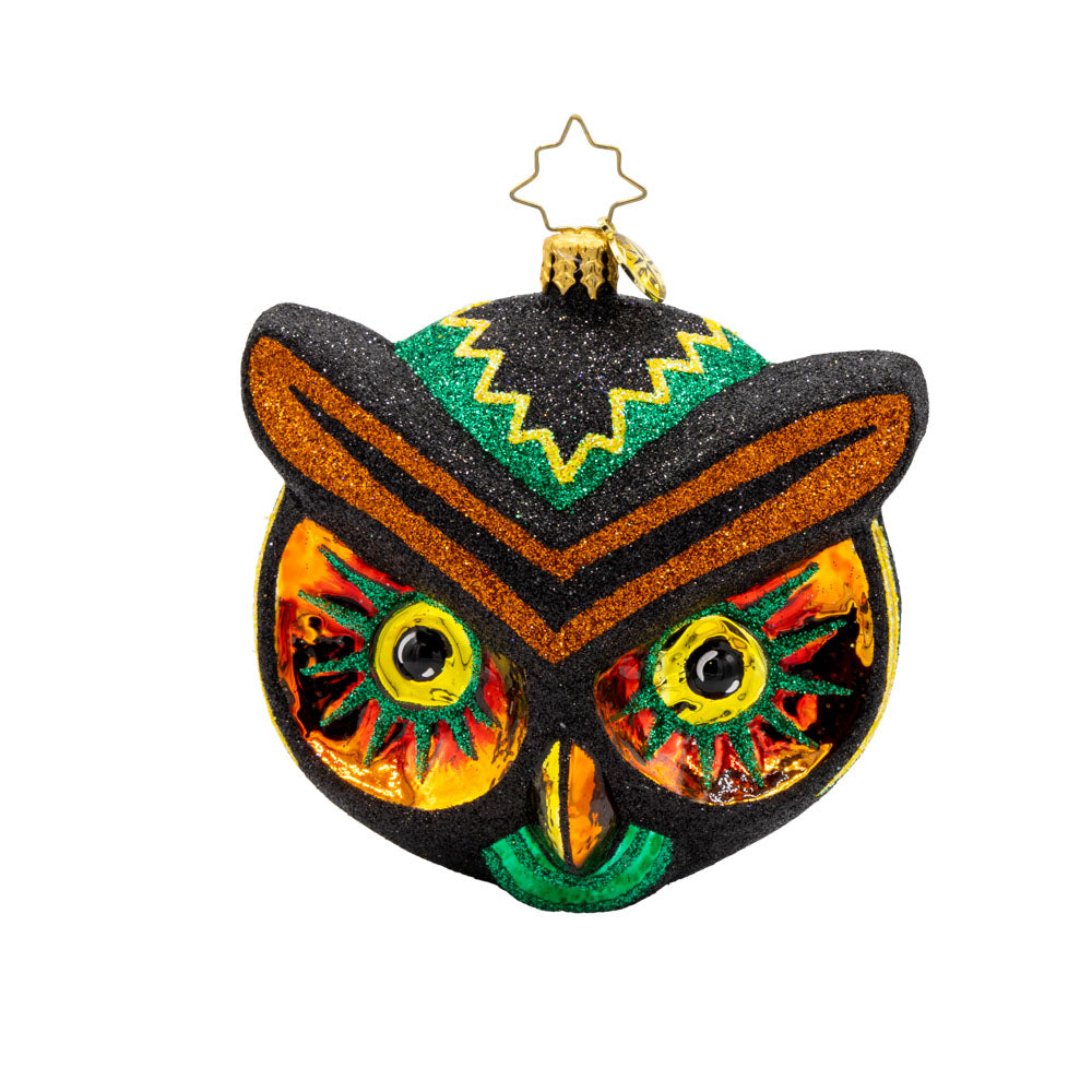 Hoot of the Night ornament. This owl features spooky eyes, vibrant colors of glittering black, yellow, orange, and green. View of front.