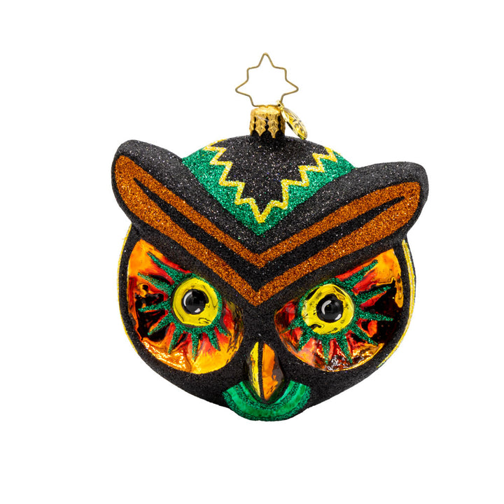 Hoot of the Night ornament. This owl features spooky eyes, vibrant colors of glittering black, yellow, orange, and green. View of front.
