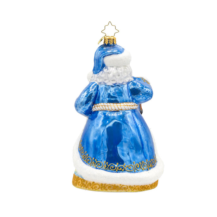 Coastal Claus ornament. Santa dons a blue robe with hand painted lighthouse scene. View of back.