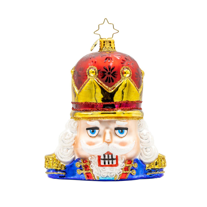 Nutty Noel ornament. This nutcracker seen from the shoulders up, where's a crown of red and gold. View of front. 
