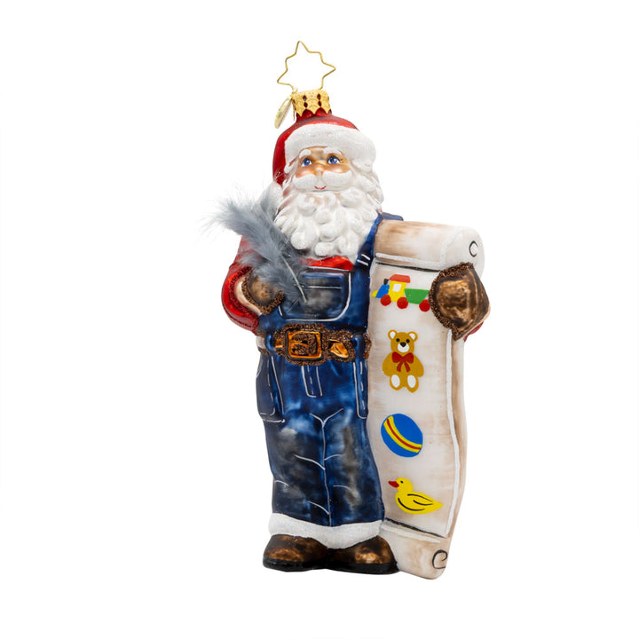 Santa's Holiday Roll Call ornament. Santa is wearing blue work overalls and is holding a long list of toys with quill in hand. View of front. 