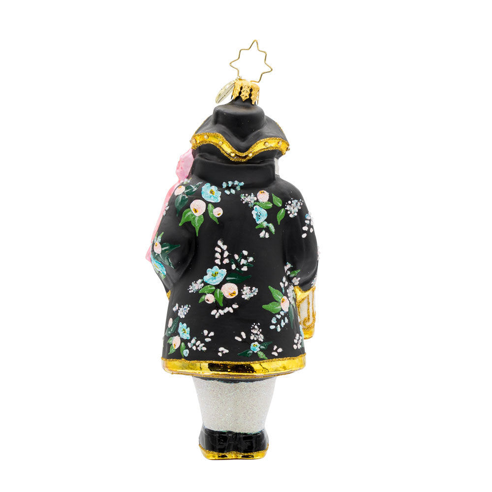 Chirp n Claus' ornament. Complete with a parrot and a gilded cage. Santa is dressed in a stylish black coat and hat. View of back.