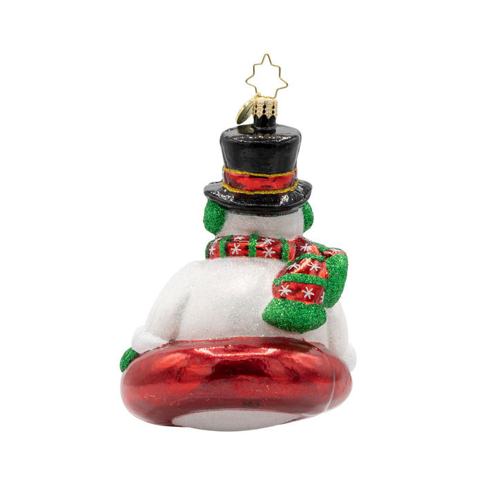 Snowy Slider ornament. This snowman is bundled up with a top hat sitting on a red innertube. View of back.