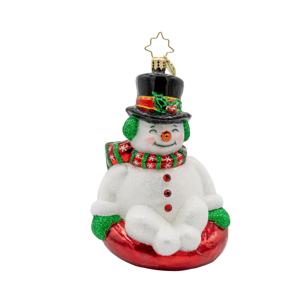 Snowy Slider ornament. This snowman is bundled up with a top hat sitting on a red innertube. View of front. 