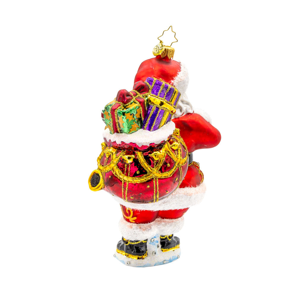 A Clause to Celebrate ornament. With his festive lantern, sparkling eyes, and a cuddly teddy bear by his side. He's dressed in his traditional red suit and hat. View of back.