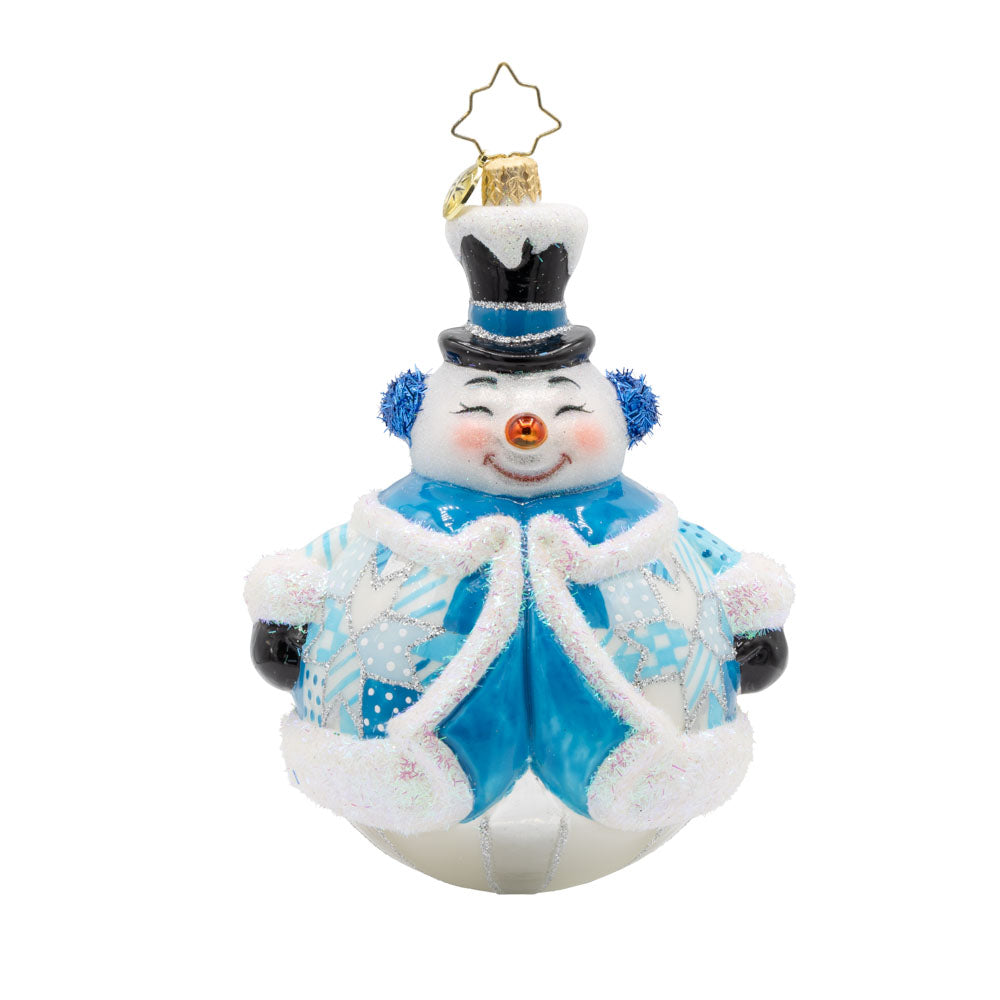 Quilted Jolly Snowman ornament. Bundled up in a quilted jacket, with glittery earmuffs and a charming frosty face. View of front. 