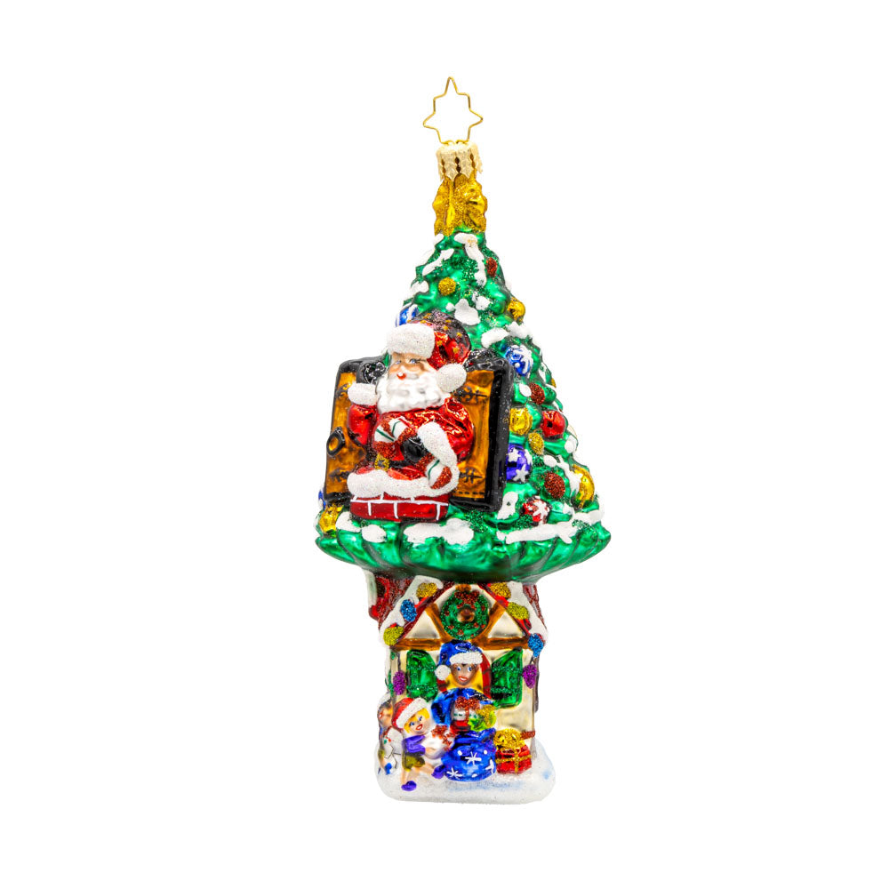 Treehouse Hideaway ornament. Santa’s treehouse is nestled high in the trees above Santa's Workshop. View of front. 