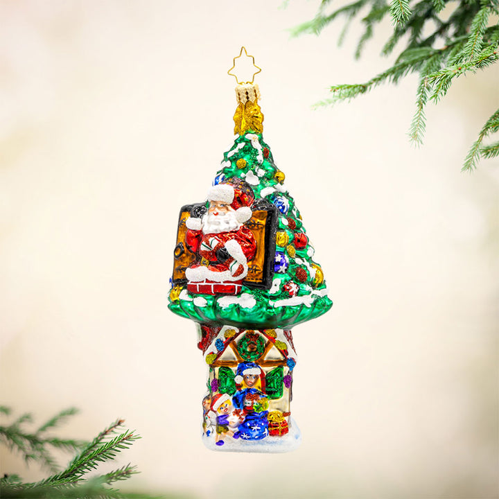 Treehouse Hideaway ornament. Santa’s treehouse is nestled high in the trees above Santa's Workshop. View of front. 