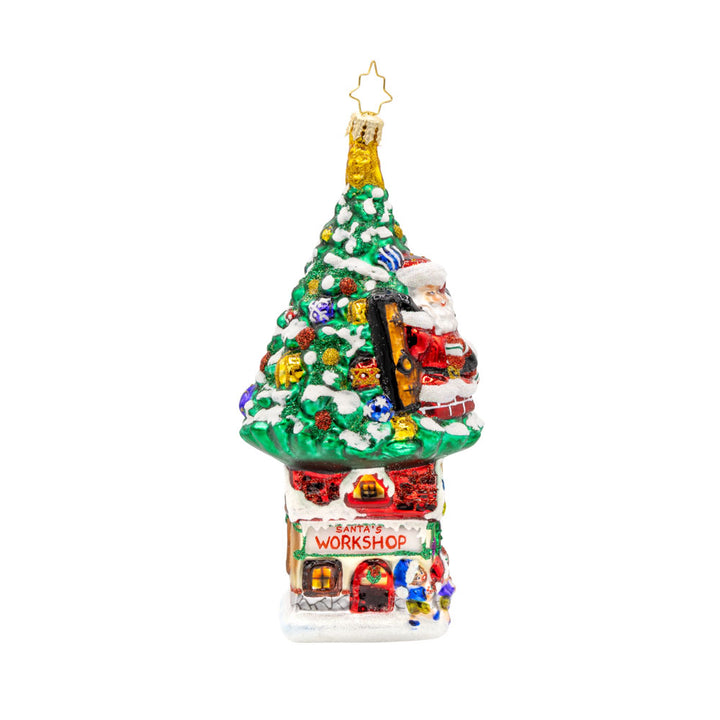 Treehouse Hideaway ornament. Santa’s treehouse is nestled high in the trees above Santa's Workshop. View of left side.