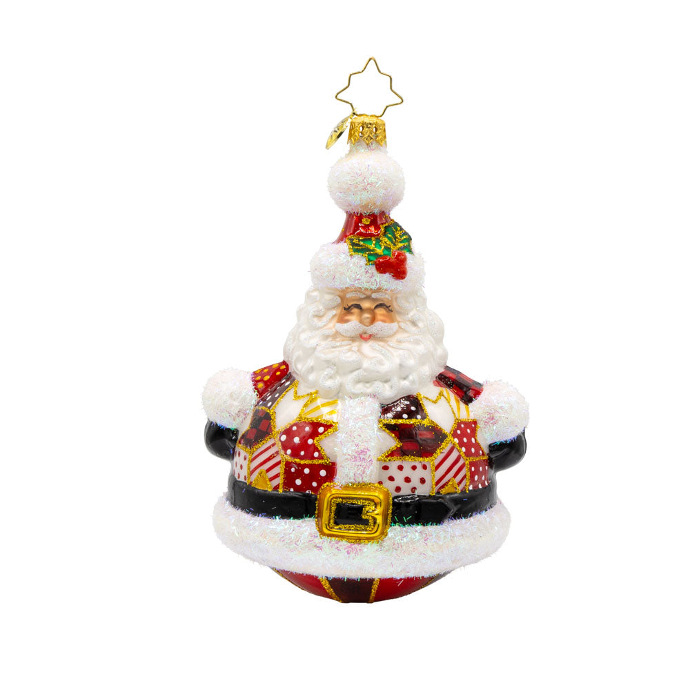 Quilted Jolly Claus ornament. Santa is dressed in a cozy patchwork quilt with shiny buttons and a festive hat. View of front. 