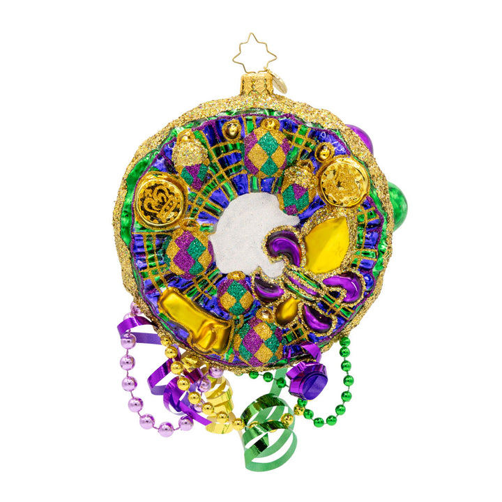 Mardi Gras Majesty ornament. This festive Mardi Gras wreath features vibrant colors, intricate details, and playful elements. View of back.