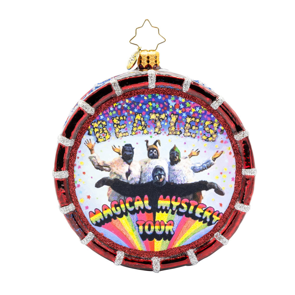 Magical Mystery Tour Drum ornament. Featuring the Beatles iconic "Magical Mystery Tour" logo and a shimmering drumhead. View of front. 
