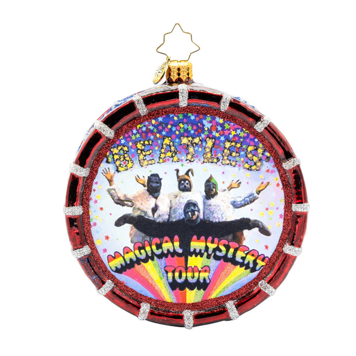 Magical Mystery Tour Drum ornament. Featuring the Beatles iconic "Magical Mystery Tour" logo and a shimmering drumhead. View of front. 
