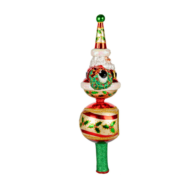 Santa and decorated round tree-topper. View of left side.