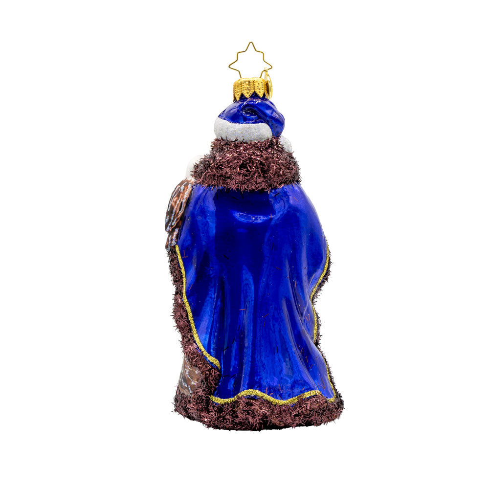 Mountain Majesty St. Nick ornament.  Santa’s dons a hand-painted mountain-scene coat with an eagle by his side. View of back.
