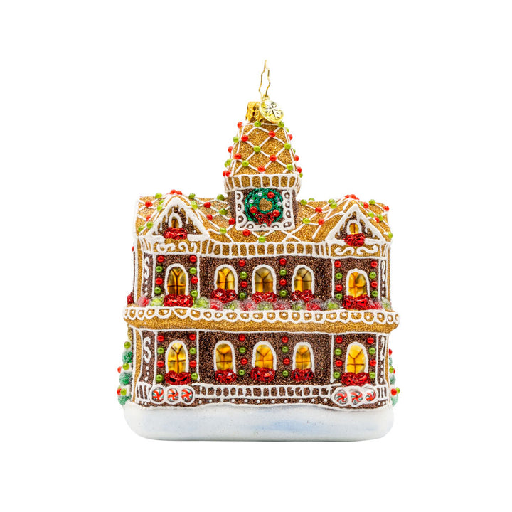 Gingerbread Manor ornament. With candy details and frosting accents on this gingerbread house. View of back.