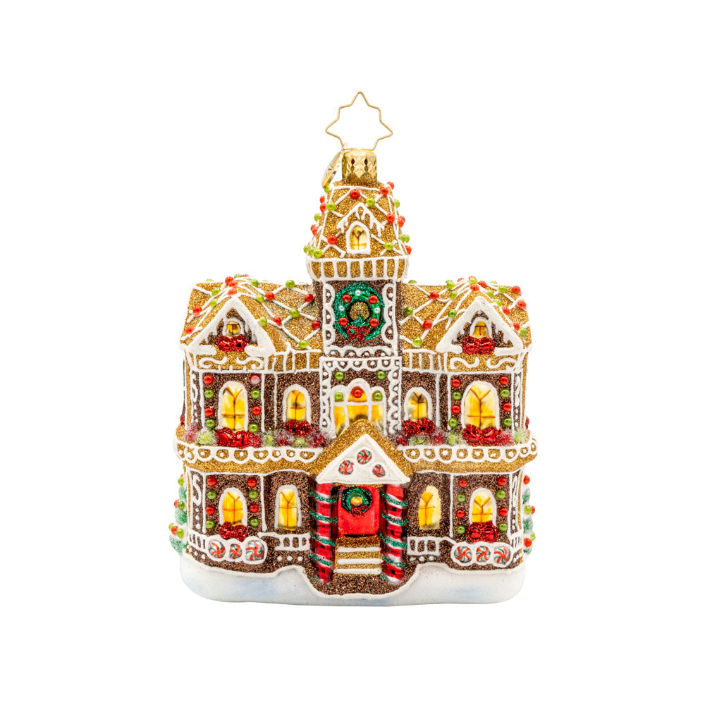 Gingerbread Manor ornament. With candy details and frosting accents on this gingerbread house. View of front. 