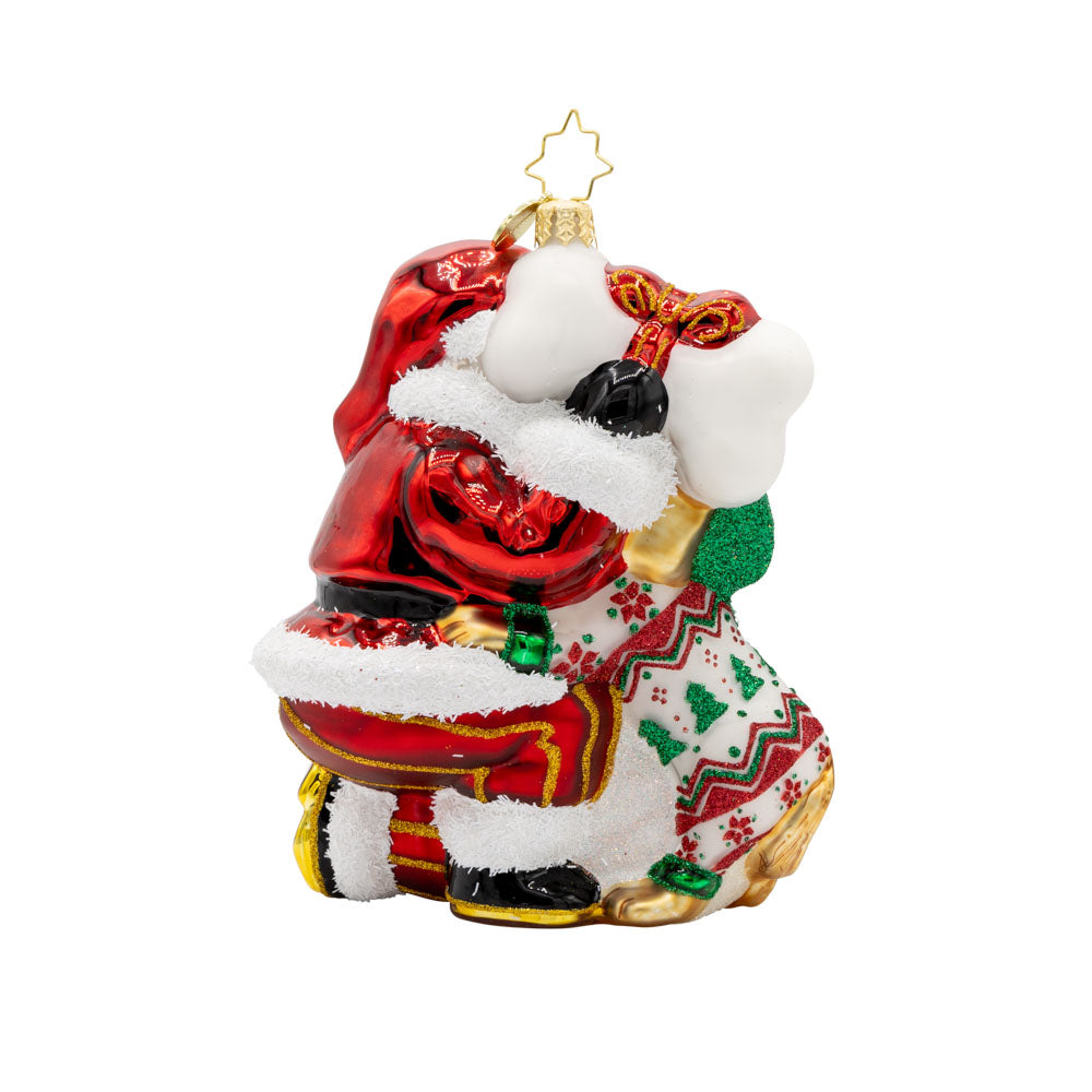 Santa's Pawsome Playtime ornament.  Santa has a playful pup dressed in festive pjs to keep him company. View of back.