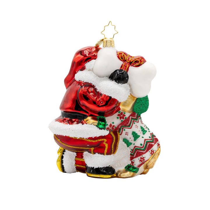 Santa's Pawsome Playtime ornament.  Santa has a playful pup dressed in festive pjs to keep him company. View of back.
