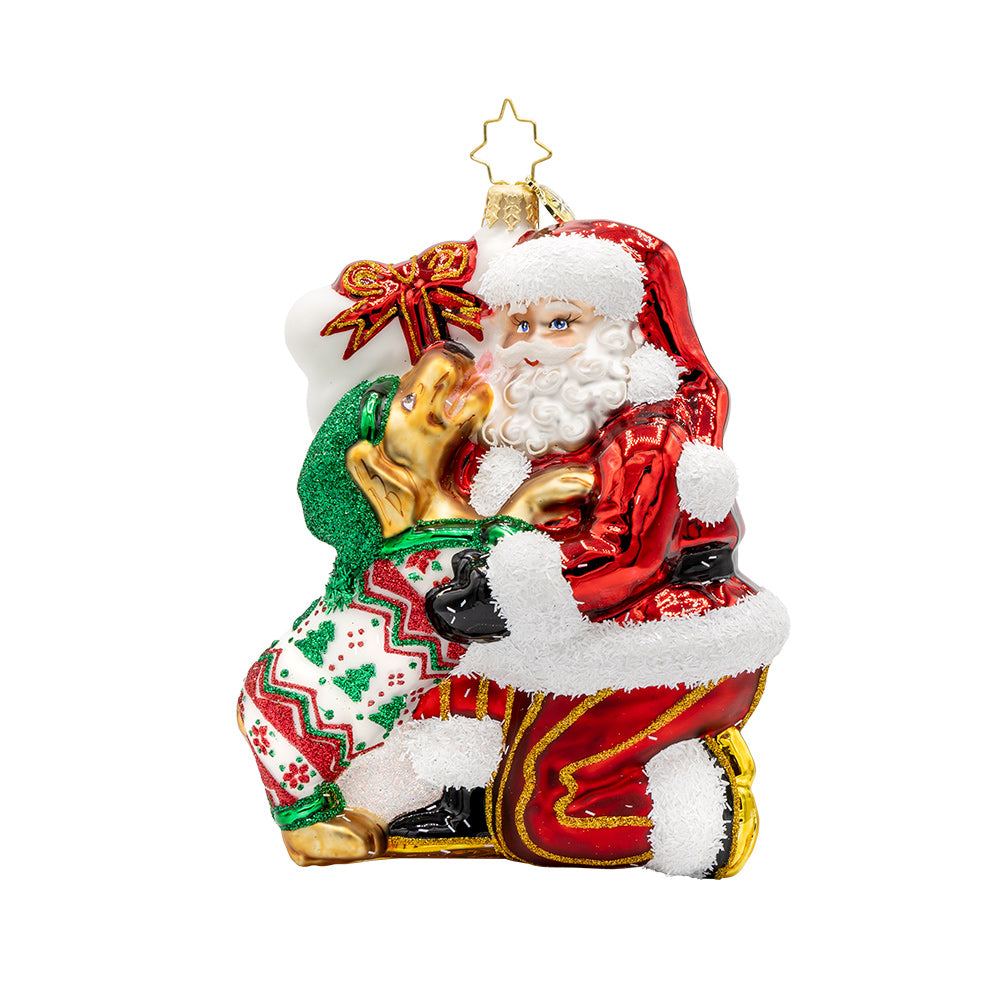 Santa's Pawsome Playtime ornament.  Santa has a playful pup dressed in festive pjs to keep him company. View of front.