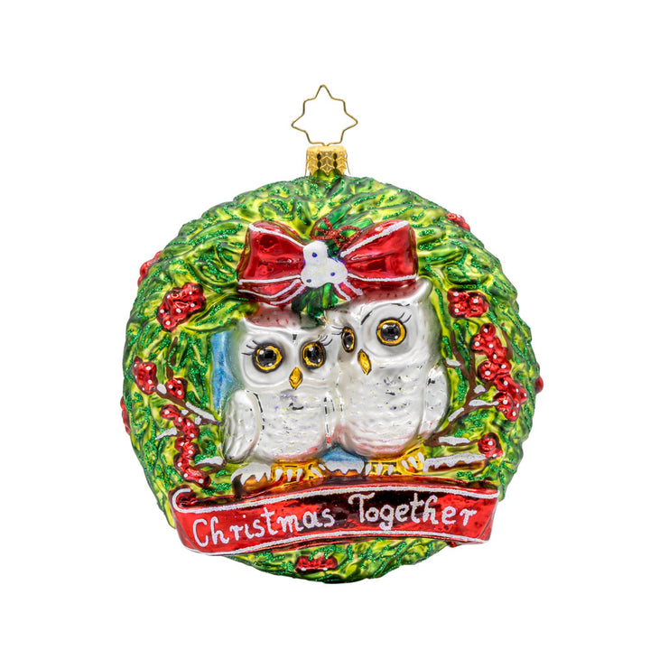 Christmas Together Wreath ornament. Two owls are nestled together on a snowy branch with a ribbon that says "Christmas Together" below them. View of front. 