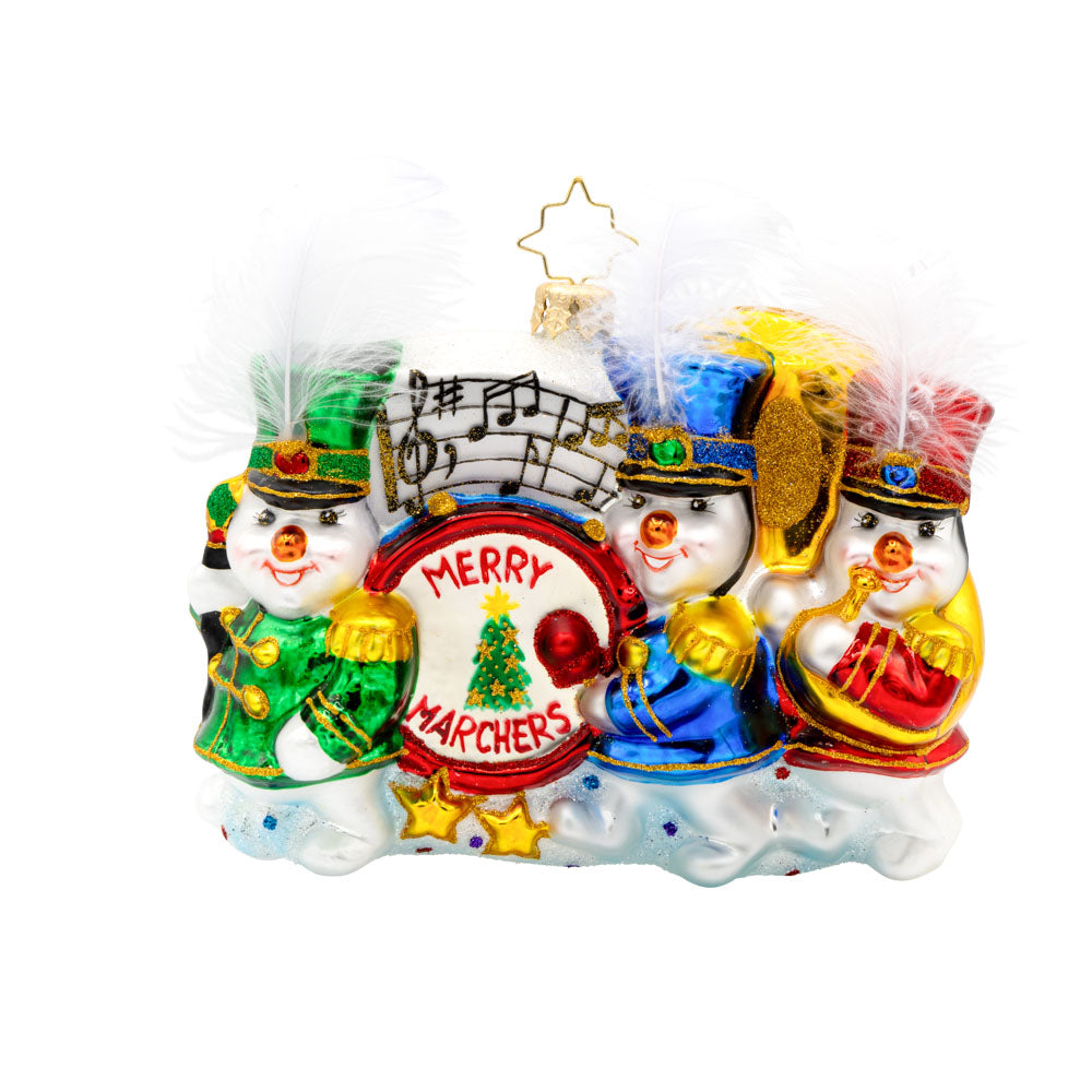 Musical March ornament. Our trio of cheerful snowmen donned in marching band outfits and instruments are ready to serenade you with festive tunes. View of front. 