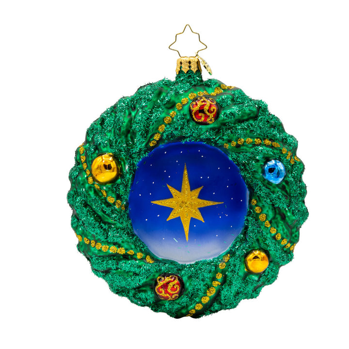 Sacred Harmony Wreath ornament. An elegantly designed wreath, showcasing a charming church in the center. View of back.