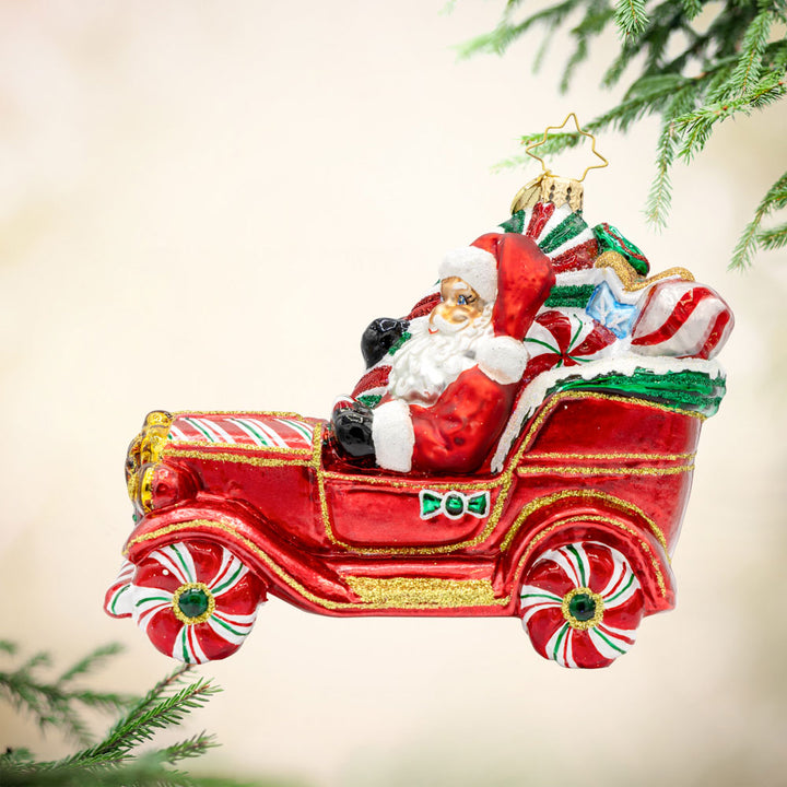 Sweet Ride Cruiser ornament. Santa drives his candy-themed car. View of front. 