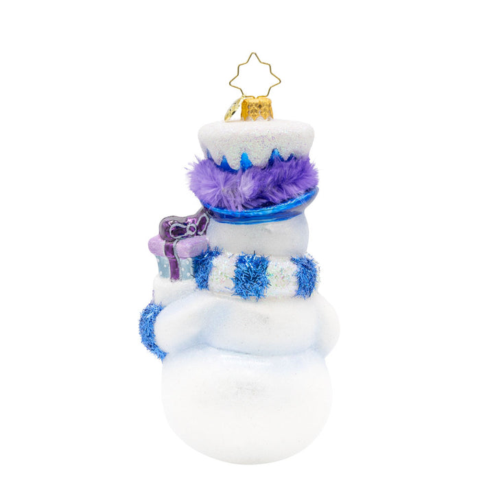 Snowy Stocking Surprise ornament. This snowman features an oversized stocking in festive colors of blue and purple. View of back.