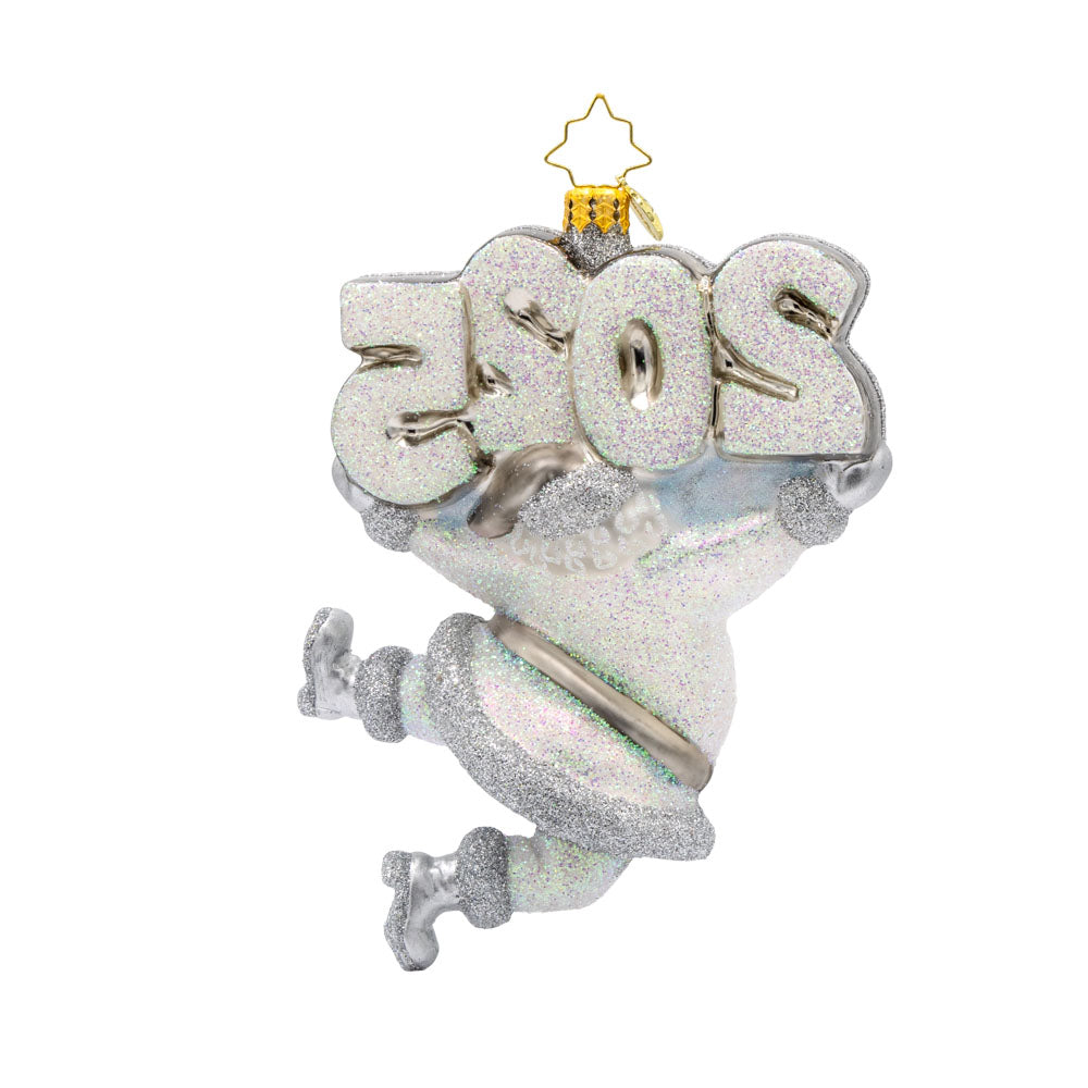 Oh, Shiny Night Ornament! Santa is shining bright, ready to spread holiday cheer. Dressed in a shimmering silver suit and a sparkling hat. "2025" is held above his head in similar colors. View of back.