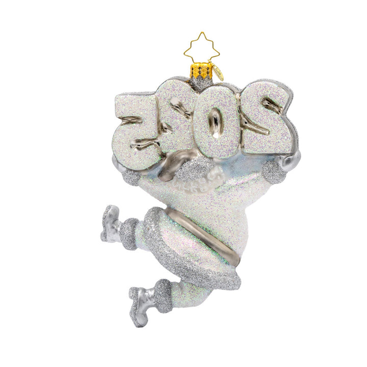 Oh, Shiny Night Ornament! Santa is shining bright, ready to spread holiday cheer. Dressed in a shimmering silver suit and a sparkling hat. "2025" is held above his head in similar colors. View of back.