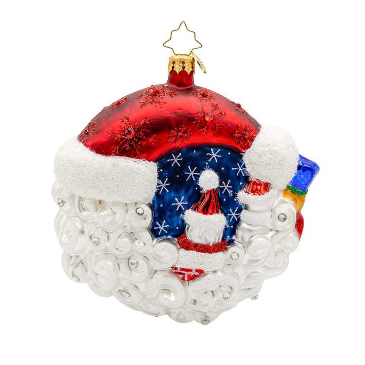 A Merry Little Christmas ornament. Santa, joined by his trusty companions - a cheerful snowman and a dapper nutcracker - Santa's face reimagined as a half-moon shapes the scene into a festive decorated round. View of back.