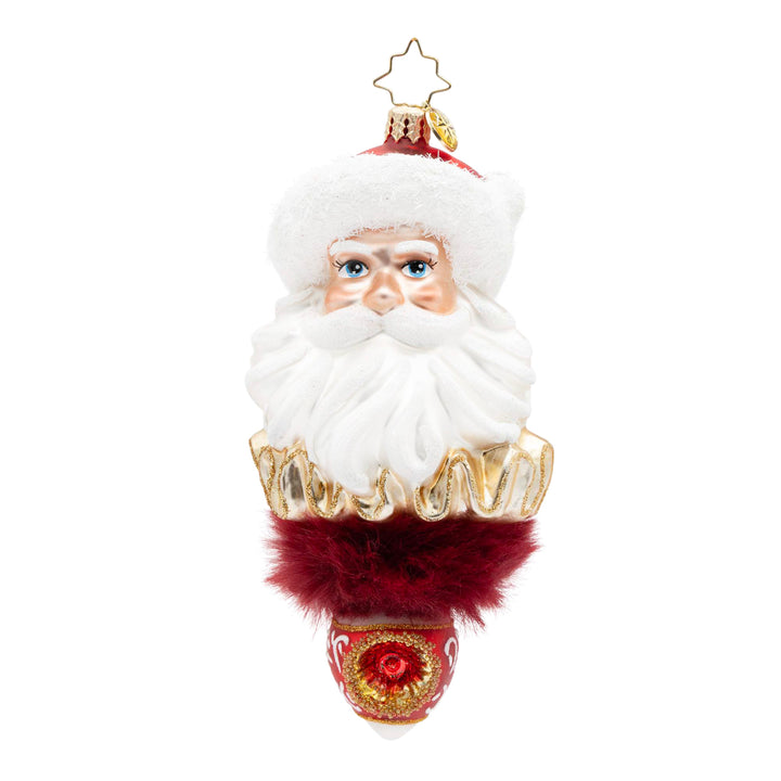 Marvelous Nicholas. Ornament of Santa's head framed in cascading ivory satin, rich flocked velvet, and a flourish of marabou feathers and below, a vintage-style reflector in red and gold colors and gilded detailing. View of front