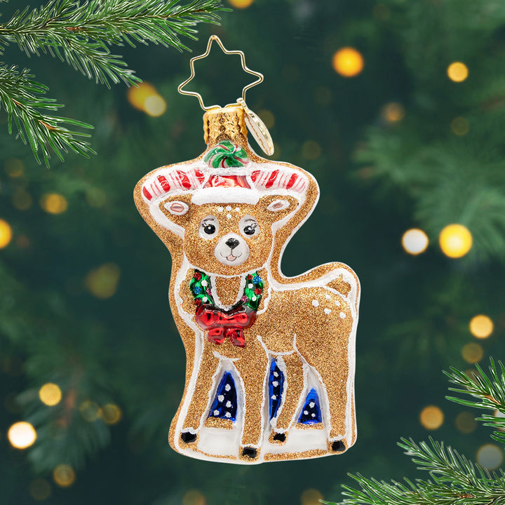 Doughy Dasher Gem. Sparkly brown reindeer ornament with a wreath on his neck. View of front.