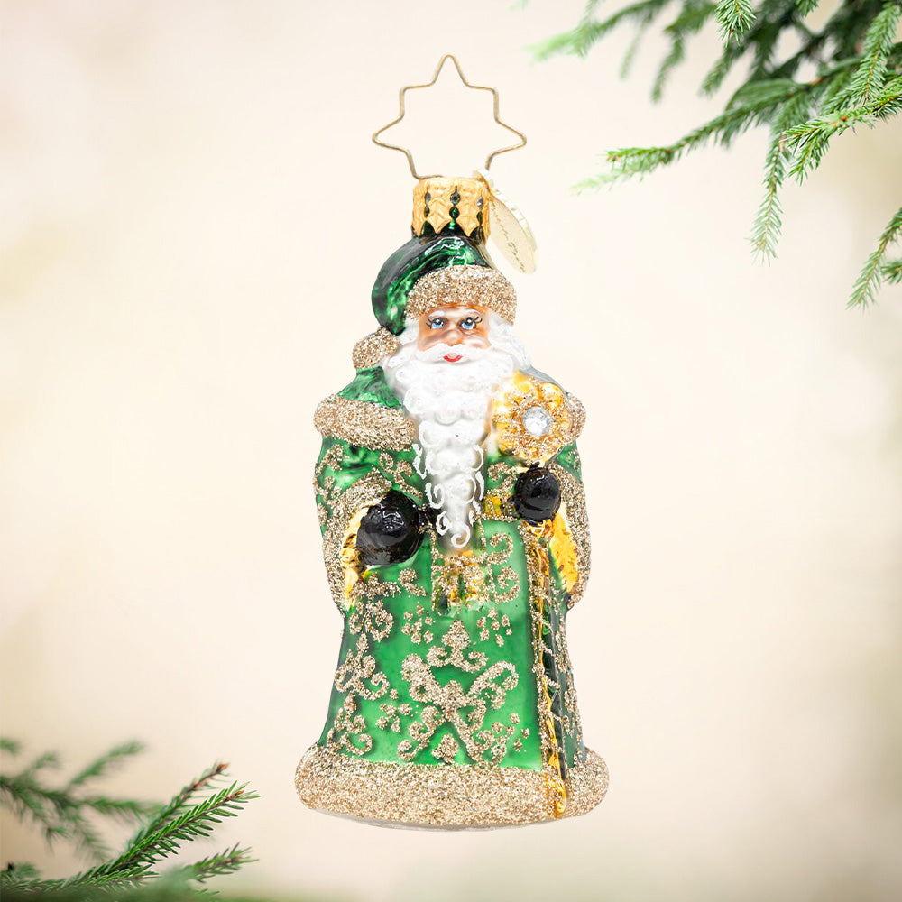 Emerald Elegance Gem. Santa ornament in a sparkly green and gold robe. View of front.