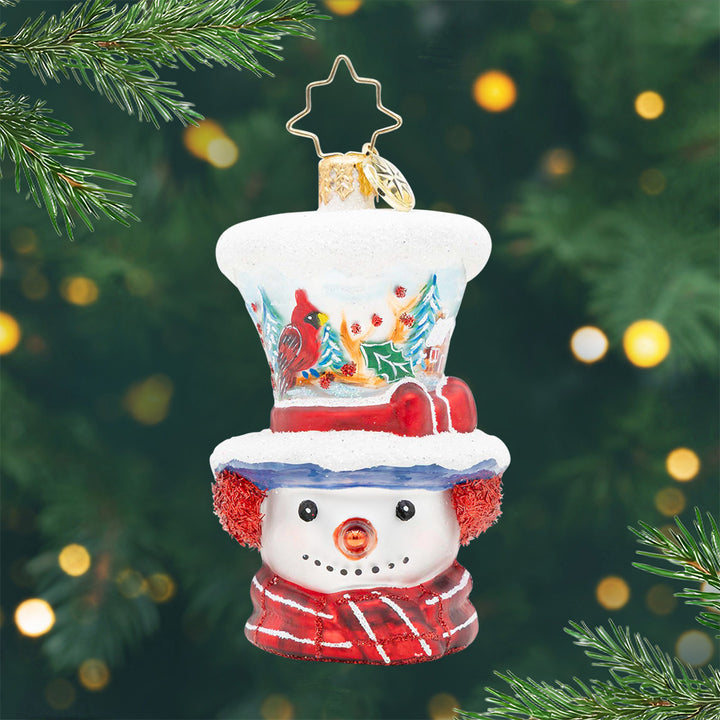 Snowy and the Cardinals Gem. Snowman ornament with a scenic view of cardinals and trees painted on it's white top hat. View of front