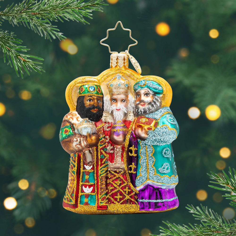 Journey of the Wise Men Gem. Ornament of the Three Kings Man colored in vibrant red, greens, purple and gold. View of front